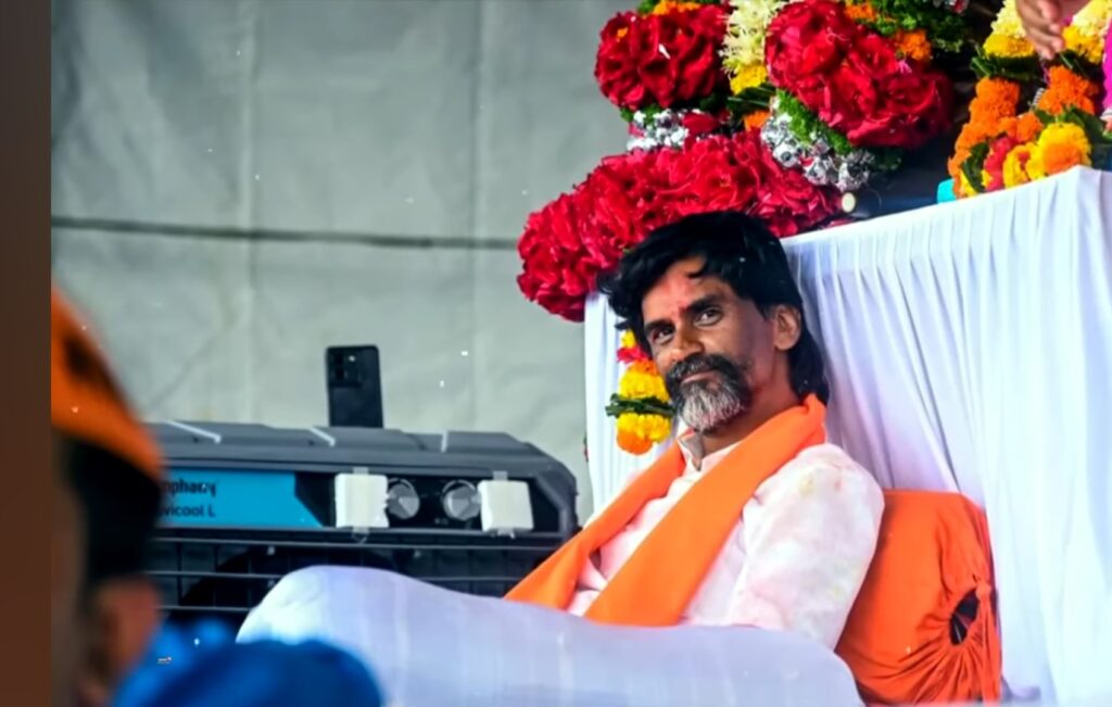 Man resting on bed with orange scarf, surrounded by flowers